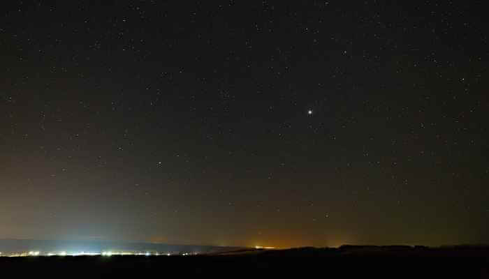 Planet Jupiter in the night starry sky